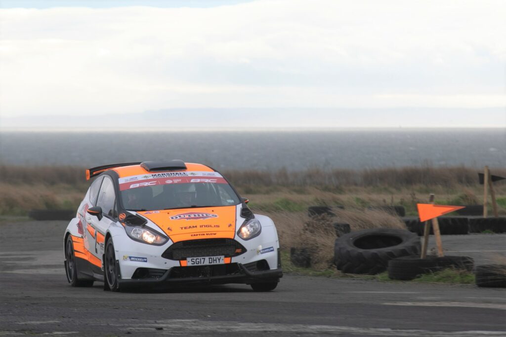 Overall championship winners Alister Inglis and Colin Inglis in their Fiesta, with a full complement of wheels.
