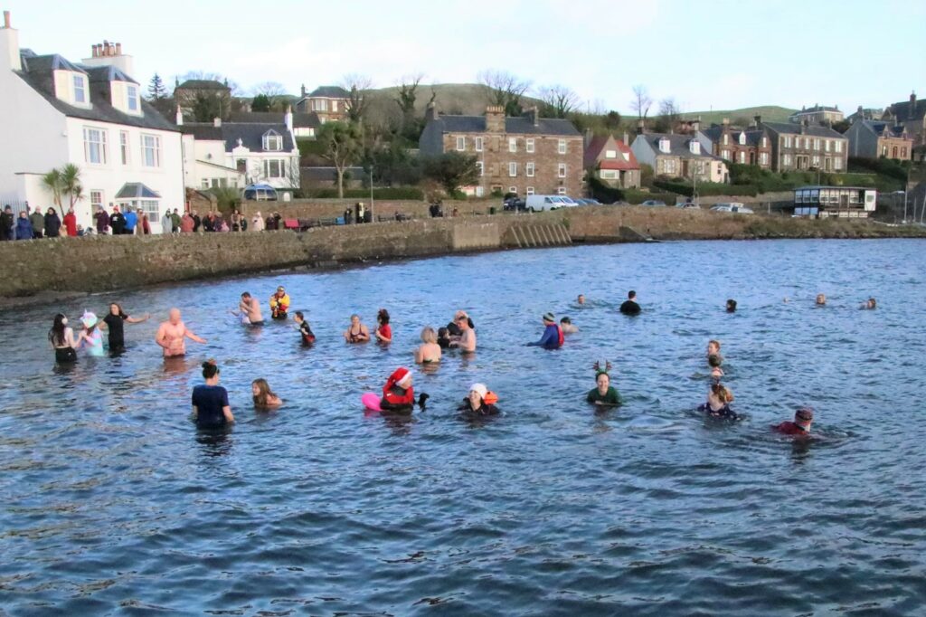 Some people were in and straight back out the water but many enjoyed a swim while they were in the water.
