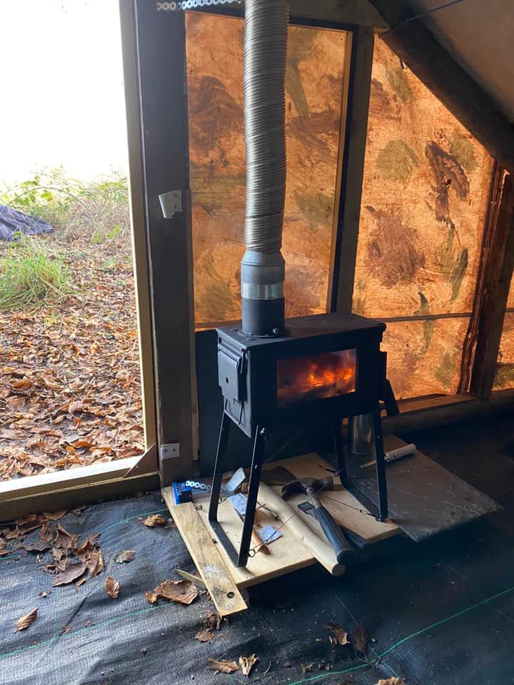 A homemade wood stove will help to keep Jim and his occasional visitors warm during the cold winter nights.