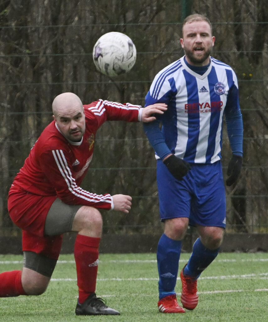 Andy ‘Zoomer’ Martin  sees off a Calderglen attack on the SLT goal. Photograph: Iain Ferguson, alba.photos