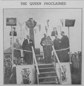 Proclamation party at Campbeltown Cross: Provost RW Greenlees MBE, proclaims Queen Elizabeth's accession at Campbeltown Cross. Baille MG McCallum and Sheriff J Aikman Smith are on his right and Baille A Keith and the Rev John RH Cormack BD, on his left. The Town Clerk (Mr AIB Stewart) is behind the Provost.