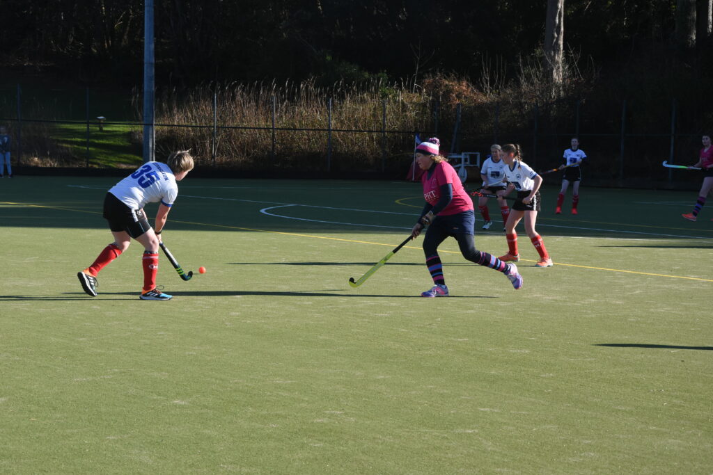Dame of the Game Dawn Lyle clears from defence.