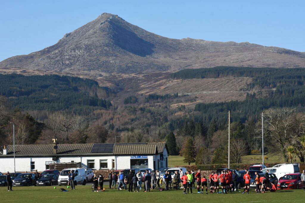 More people are out and about like this crowd attending a football match on Arran last weekend.