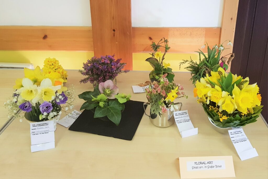 The floral displays filled the hall with beautiful sights and smells.