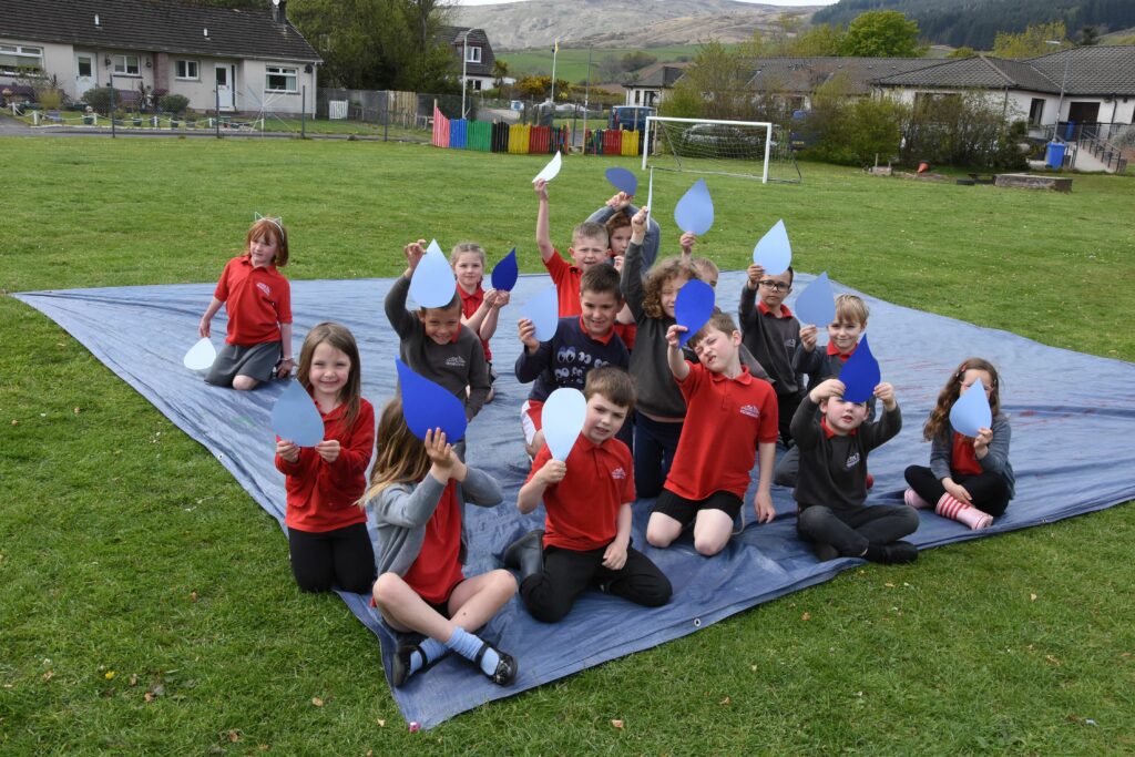 P1 and P2 pupils were the raindrops in the living interpretation of the water cycle.