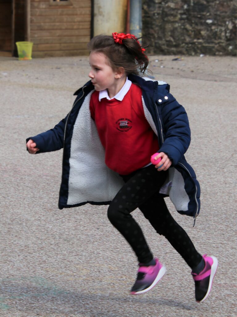Pupils raced around the playground at Dalintober in search of hidden eggs.