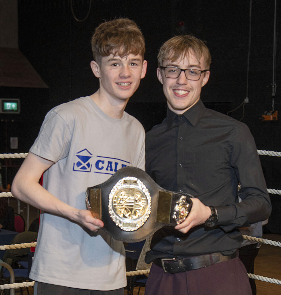 Josh Dieguno was presented with the Junior Boxer of the Year belt by Cameron Whyte, himself a member of the Club and former member of the Scotland Squad.  Photograph: Iain Ferguson, alba.photos.