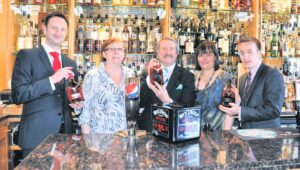 In 2012: Scott Grierson, Richard Paterson, world famous master blender of Whyte and MacKay and Graeme Muir of Whyte and MacKay, with Flora Grant and Marion MacKinnon of the Ardshiel Hotel.