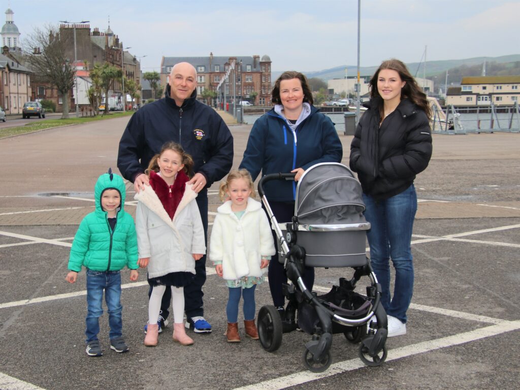 Back row: David Mullen, Lesley Mullen and Alecia Bell. Front: David, Amara and Aria Mullen with baby sister Arla in the pram.