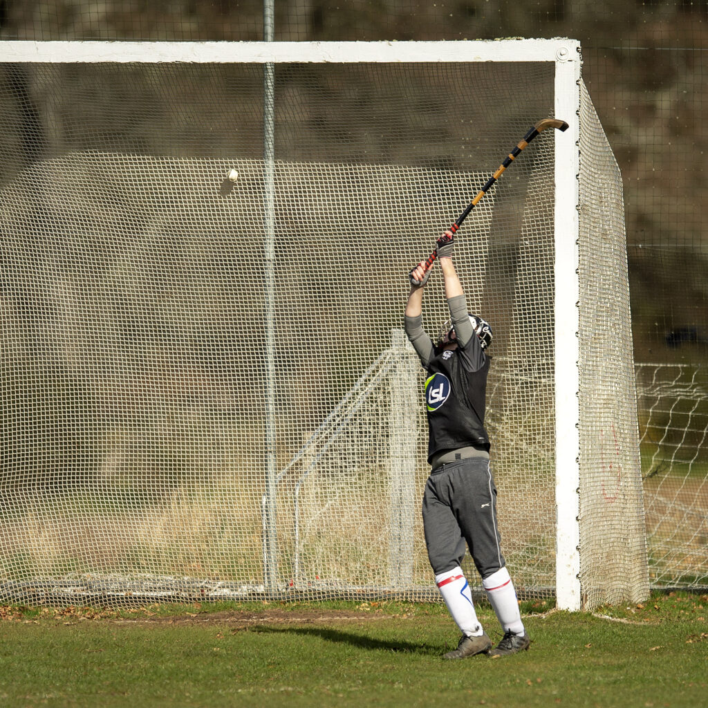 Oban Camanachd keeper Cameron Sutherland is left watching the ball hit the back of the net on seven minutes. Photograph: Neil Paterson.