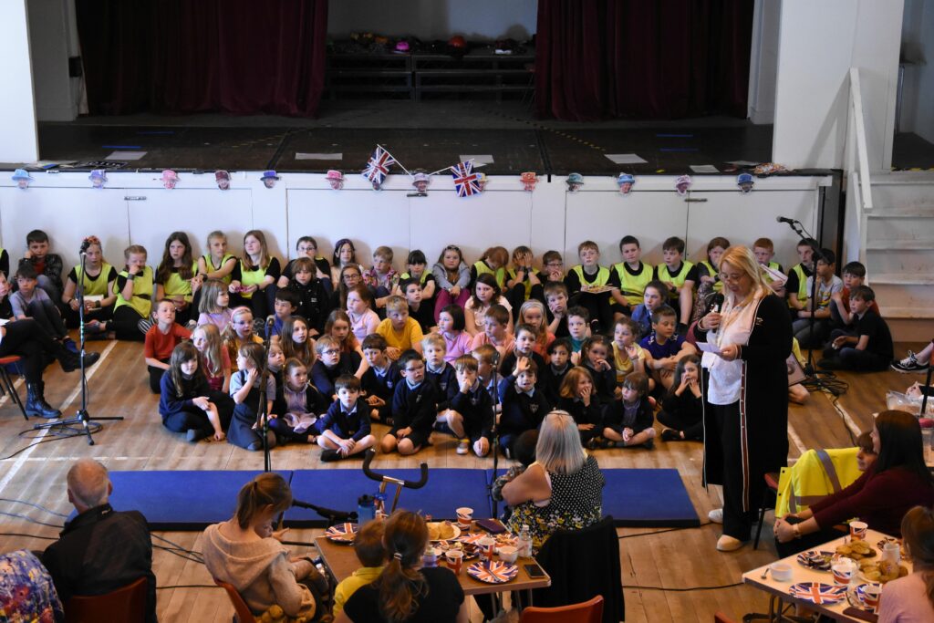Head teacher Shirley MacLachlan welcomes the audience to the Brodick Primary School Jubilee concert.