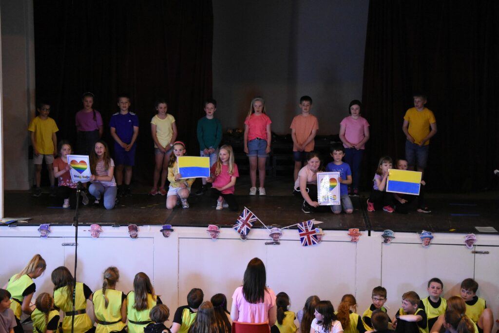 Pupils define the 2020s decade so far, showing their support for Ukraine, NHS, and staying safe during the pandemic.