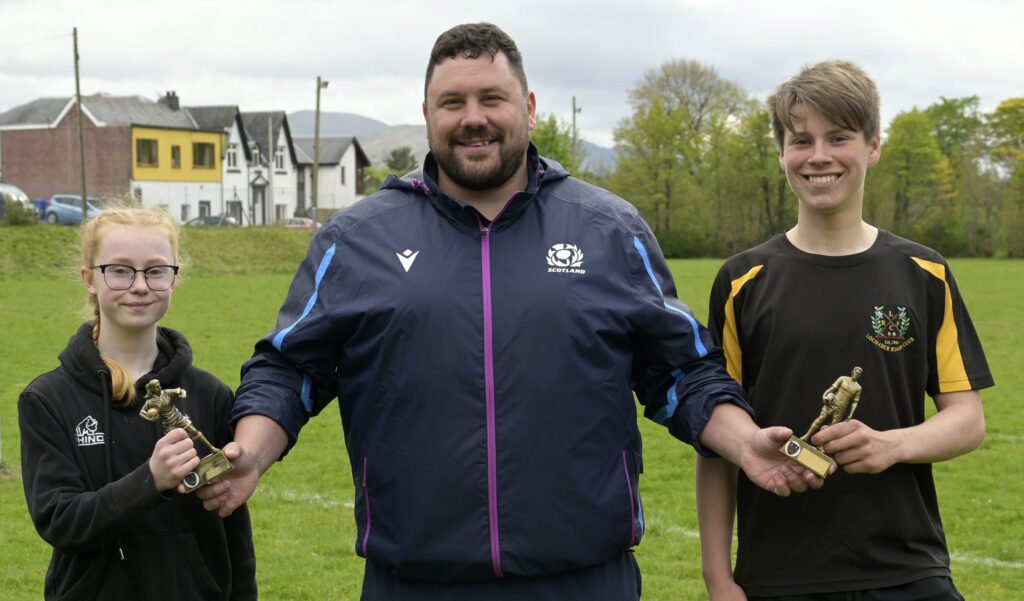 Sinclair Patience Scottish Rugby's Regional Manager for Caledonia North presented trophies Alex Drysdale captain of Lochaber High School  A  boys team and Molly Hobson, captain of Lochaber High School Girls' A Team. Photograph:  Iain Ferguson, alba.photos

NO F19 High Schools rugby 04