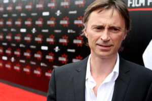 The television series, Hamish MacBeth, starred Robert Carlyle. pictured, and its popularity continues to draw visitors to Plockton decades after filming ended. Photograph: Shutterstock/Ross Wallace. NO-F20-Robert-Carlyle