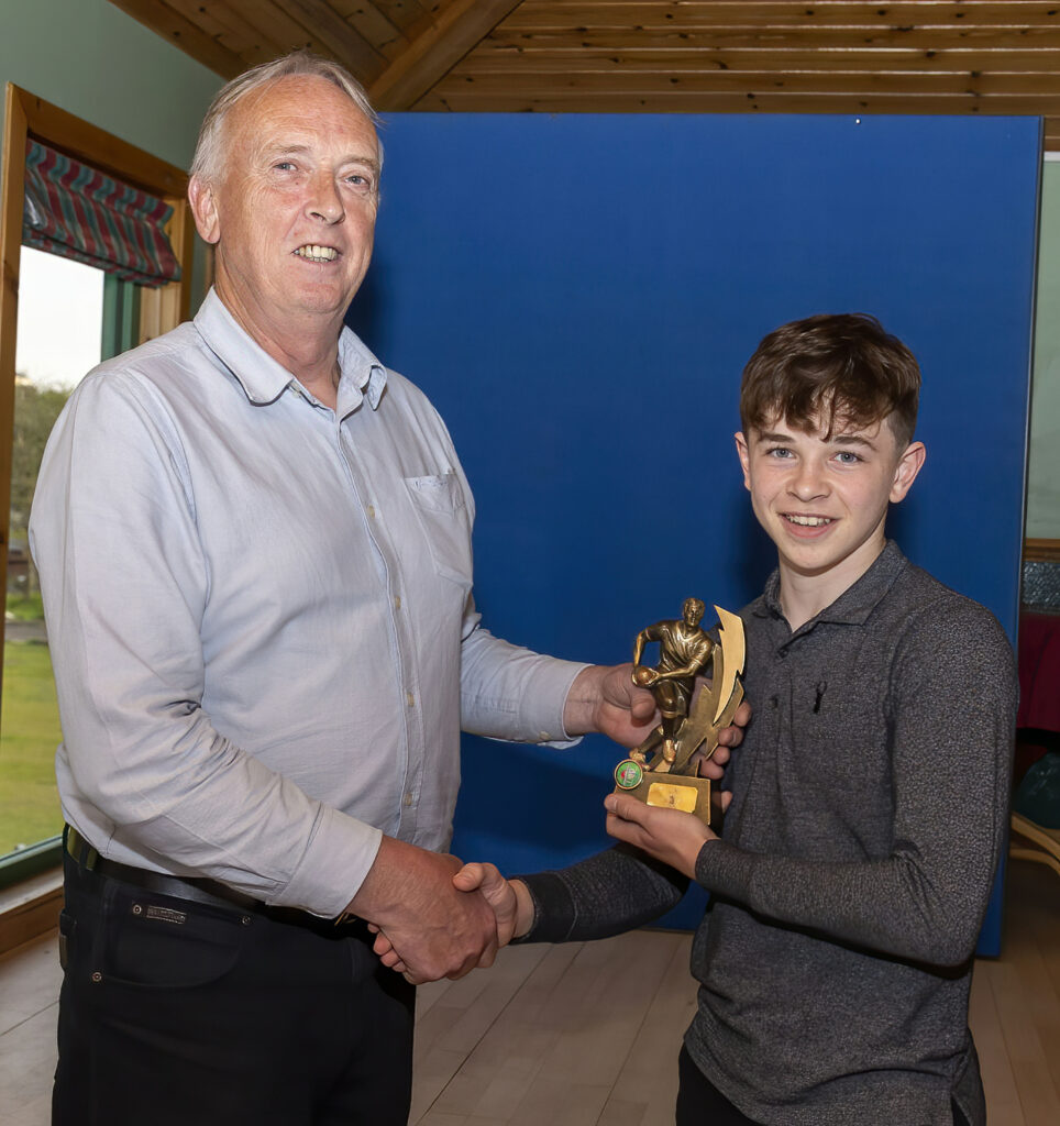 Under 14s Player of the Year Donald McCormack with youth coach Walter Speirs. Photograph: Stephen Lawson.