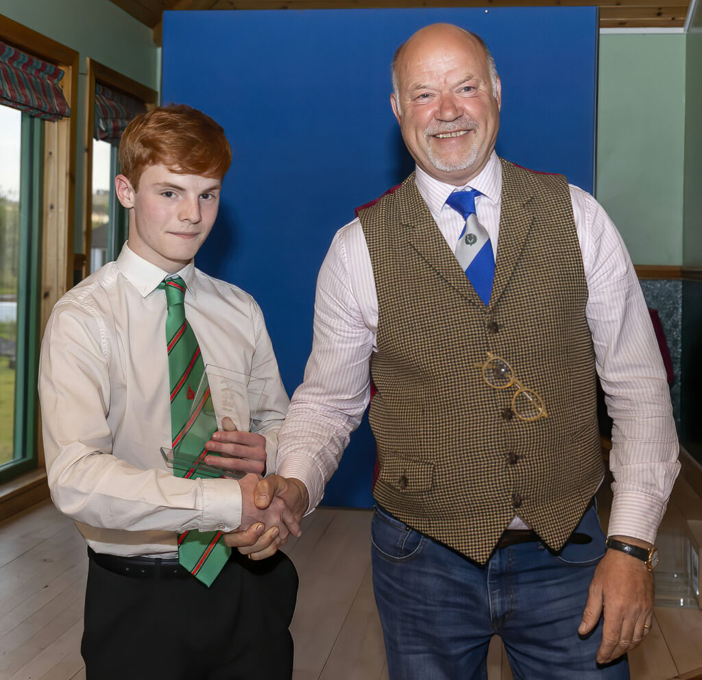 Most Improved Under 16s Player Rhys Neil with Graham Tweed. Photograph: Stephen Lawson.