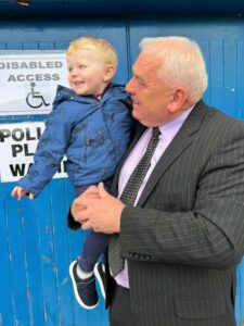 Councillor Donald Kelly and his two-year-old grandson Dudley Kelly outside the polling station at Campbeltown's Victoria Hall.