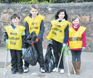 In 2012: Owen Reid, Millar Irwin, Hannah Black and Kelsey Graham were among pupils from Castlehill Primary School who went out on a clean-up. Accompanied by teachers and parents, they collected litter from the Meadows Playing Fields and Ralston Road areas around the school.