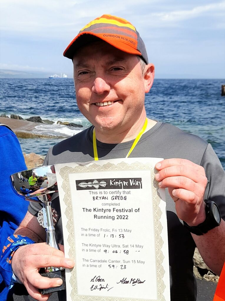 Bryan Gregg was presented with a certificate at the end of last Sunday's Great Carradale Canter, having completed the Kintyre Way Ultra and the new Friday Frolic in the days before.