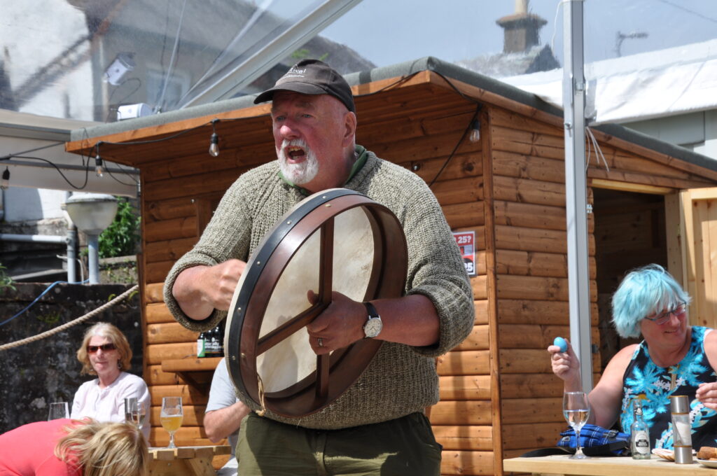 Derek Shand gives it laldy on his bodhran.
