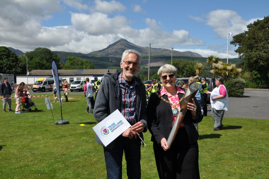 Provost Anthea Dickson and Councillor Timothy Billings with the baton.