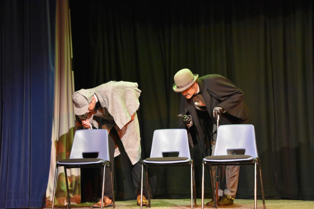 Sherlock Holmes (James Mutch) and Hercule Poirot (Andy McNamara) search for clues in Sleuth School.
