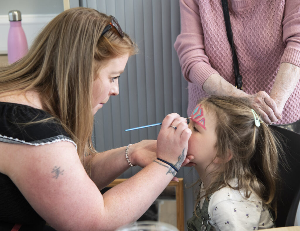 Face painting is always a popular stall with children. Photograph: Iain Ferguson, alba.photos

NO F23 Caol Community party 11
