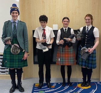 Piping winners.

NO F26 pipers 02