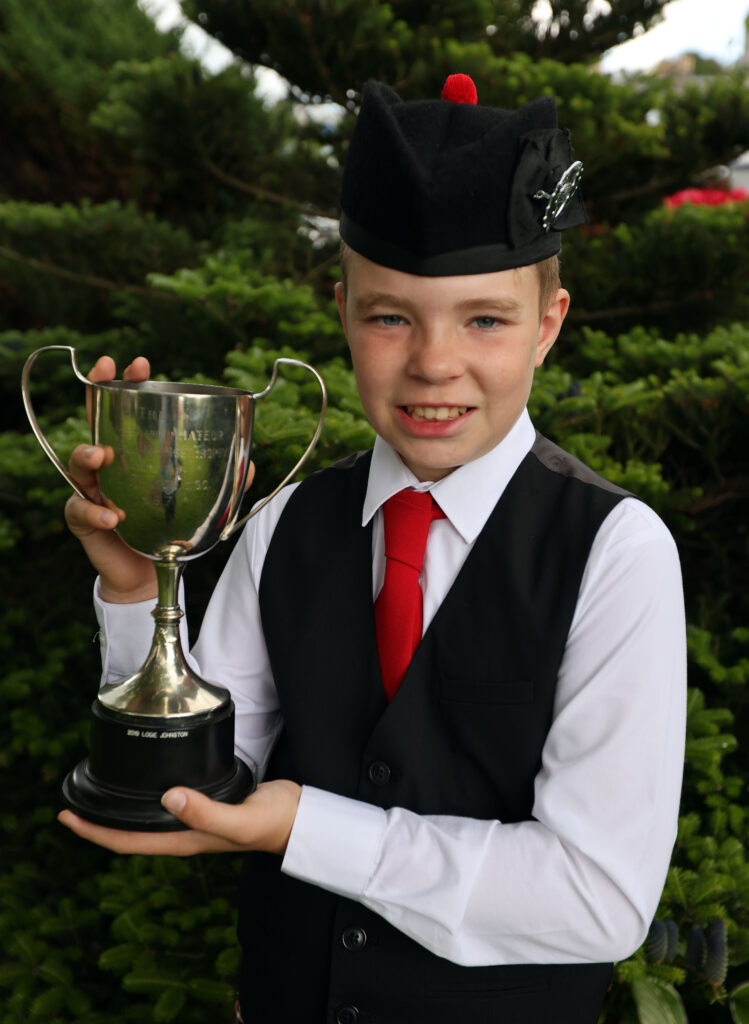 Alfie Robertson, Oban winner of the A C Beaton piping challenge trophy for march own choice playing Donald MacLean's farewell to Oban
Picture: Kevin McGlynn