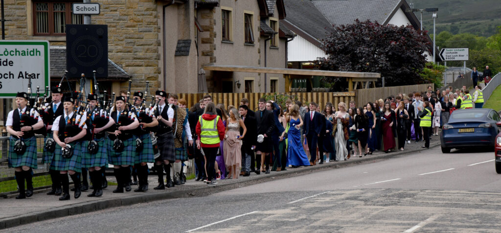 Lochaber Schools Pipe Band leads the procession from the High School. Photograph: Iain Ferguson, alba.photos