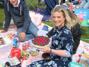 In this photograph, Andrea McShannon holds a Union Flag dessert she brought along to Sunday's fun afternoon at Southend Playing Field.