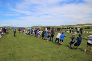 Children were keen to test their strength in the tug-of-war during Sunday afternoon.