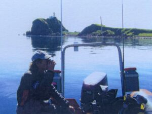 Allan Sample diving near Sanda Island. Photograph: RNLI/Marjorie Leighton.