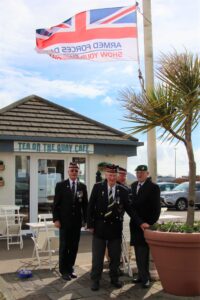 Richard Cameron, Willie McMillan, Bruce Strang and Leslie Morans did the honours and raised the Armed Forces Day flag at the head of Campbeltown's Old Quay.