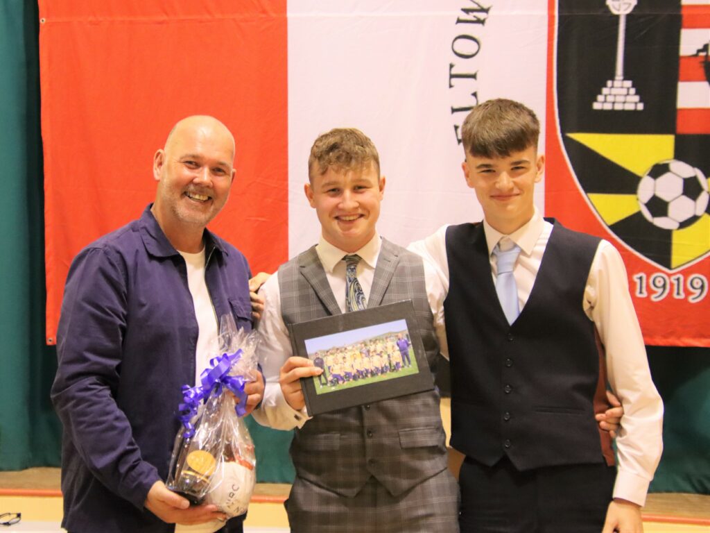 Pupils 2005s manager David Paterson receiving gifts from players Lorne Paterson and Ryan Shields.