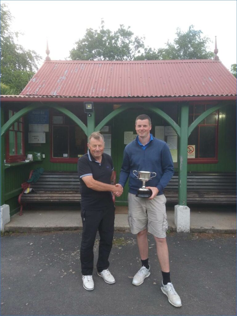 Runner up, Billy Paton congratulates Ewan McKinnon on winning the Corrie Golf Club championship.