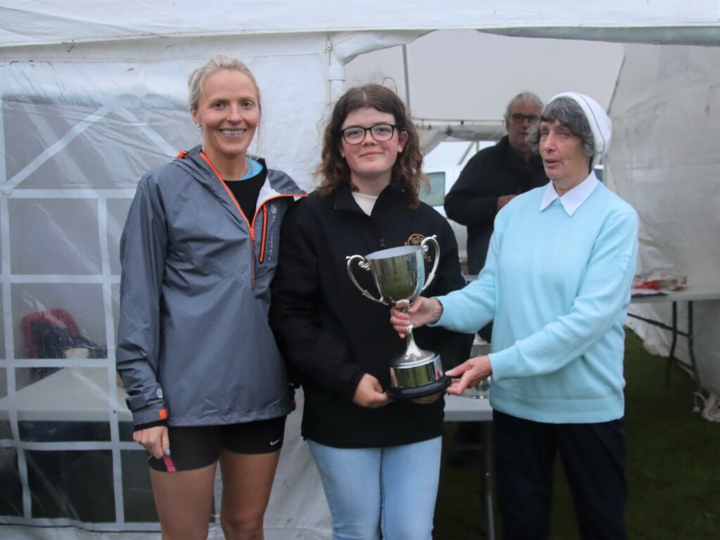 Jennifer Martin and Caryn Kerr, joint winners of the ladies’ Carskiey Cup, receiving their trophy from Jennifer McCorkindale.