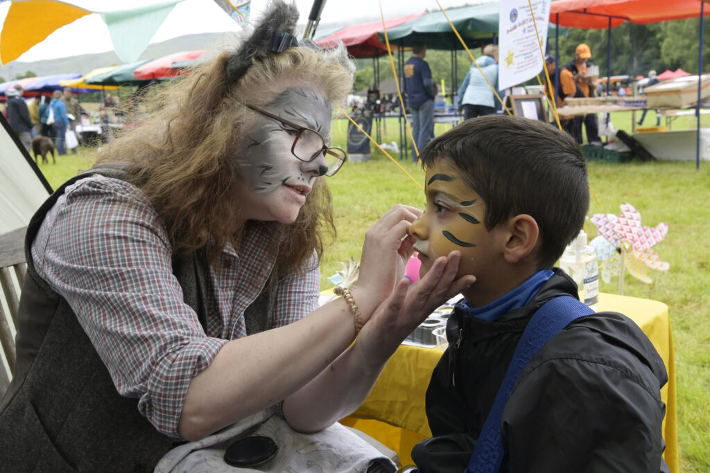 Six-year-old Shawnell Fernandes turns into a tiger at the stall set up to raise funds for Invergarry Primary School. Photograph: Iain Ferguson, alba.photos.