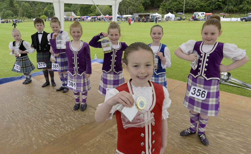 Bethany Wilson with her fellow medal winners in the HIghland Dancing Competition.  Photograph: Iain Ferguson, alba.photos.