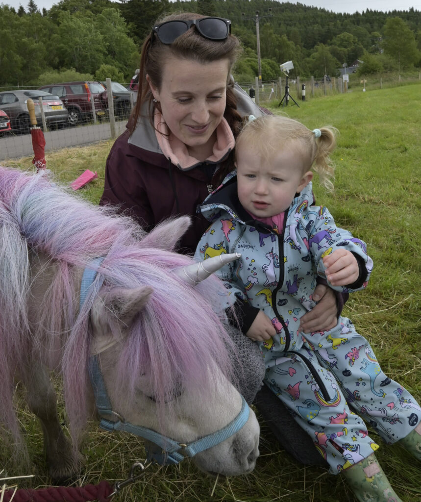 Three year old Lily Huggan couldn't believe her eyes as a colourful and mystical Unicorn was on display at the Games. Photograph: Iain Ferguson, alba.photos.