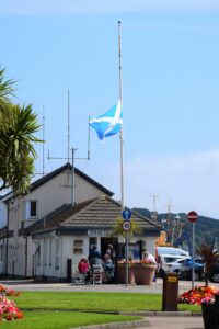 The Saltire was flown at half mast at the head of Campbeltown's Old Quay on the day of John's funeral.