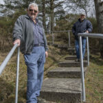 Dougie Dykes (left) and Roddy Mainland with the new metal handrails leading to the Banavie War Memorial. Photograph: Iain Ferguson, alba.photos NO F14 Banavie war memorial 01