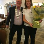 Lochaber Rotary President Simon Hardiman wishes Val McIver well on her retirement. NO F23 Val McIver 03