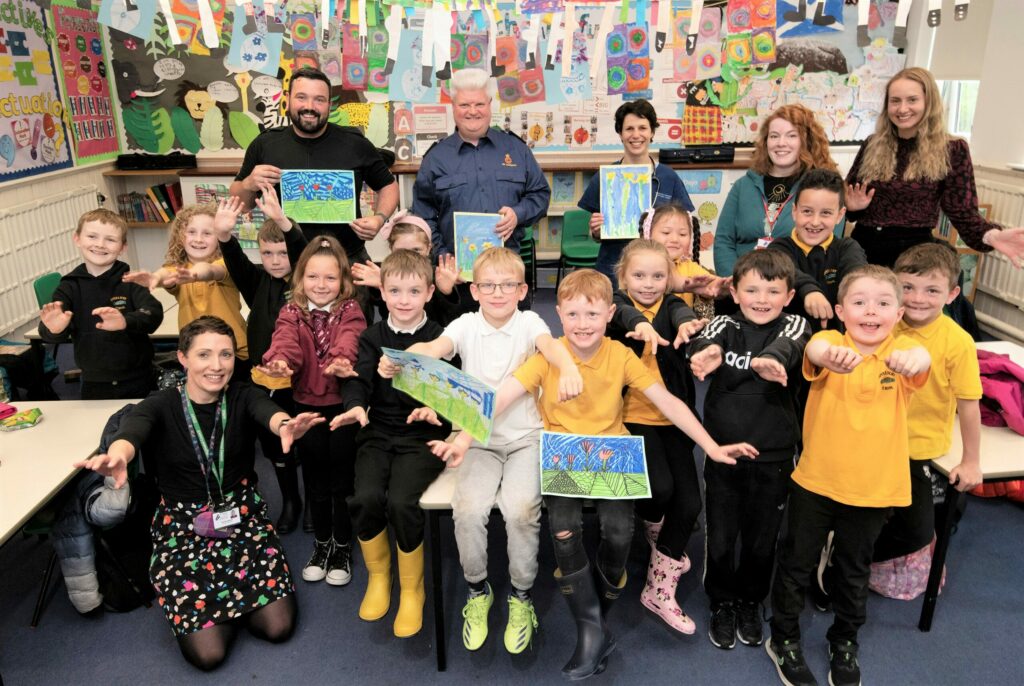 After welcoming guests with a song. primary three pupils presented letters and pictures to Police officer RhuaraidhMacKay Calum Smith of the Coastguard and Dr Olivia Wolff of the Medical Centre. Photograph: Iain Ferguson, alba.photos NO F24 Inverlochy primary pictures