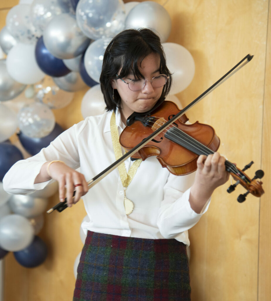 Mimi Spence from Tobermory High School, pictured, who won the Under -9 fiddle competition. Photograph: Iain Ferguson, alba.photos NO F26 Mod fiddle Mimi 02