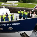 The TS John Jerwood with a Sea Cadets welcoming party on board and newly-weds Emma Watchman and Alexander Hunter. Photograph: Anthony MacMillan Photography. NO F28 sea cadets 02