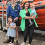 Daniel and his family at Kyle RNLI station. Photograph: Kyle RNLI. NO F30 Daniel and his family