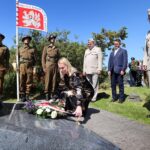 Minister of Defence Jana Černochová, along with representatives of the Army of the Czech Republic and Czechoslovak Legionary Community at the Czechoslovak Paratroopers Memorial in Arisaig. Photograph: Ministry of Defence/Czech Republic. NO F33 Czech 02