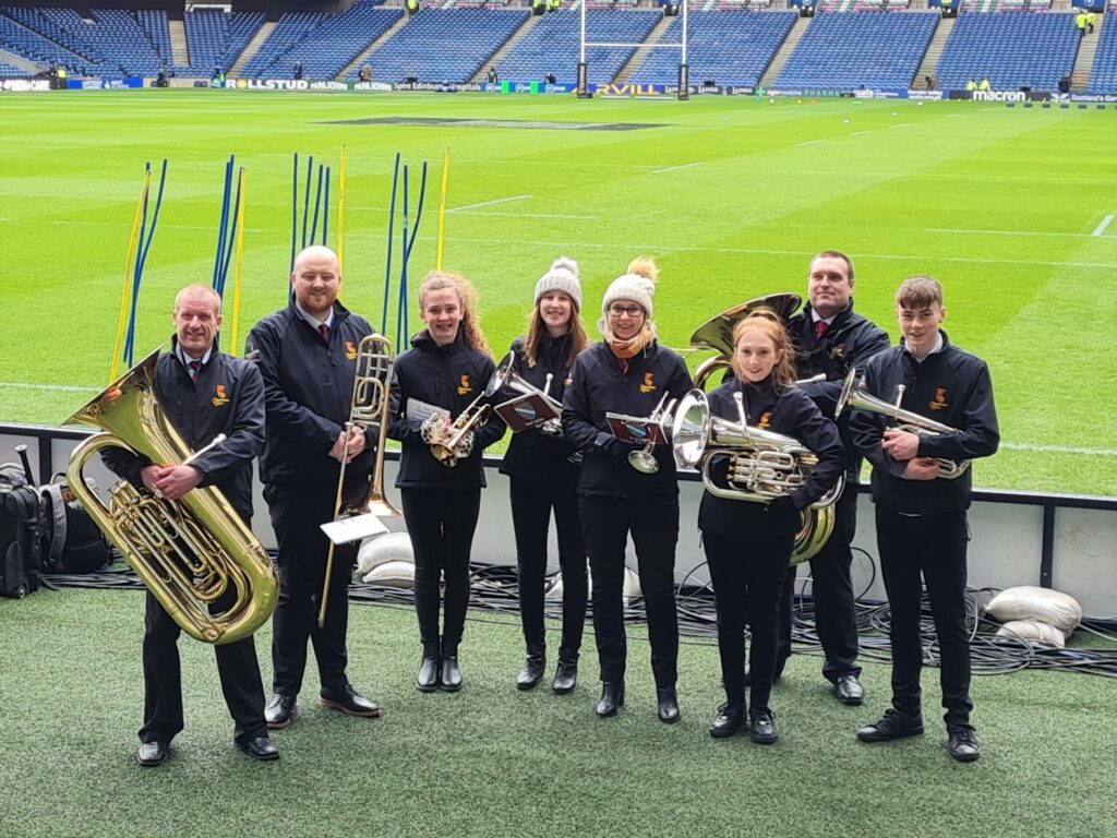Willie Ralston, David Cosgrove, Cara McFadzean, Mae Barr, Katrina Barr, Emily Bennie, Scott MacAlister and Liam Bennie, pictured from left to right, performed with Whitburn Band, Murrayfield's resident brass band.