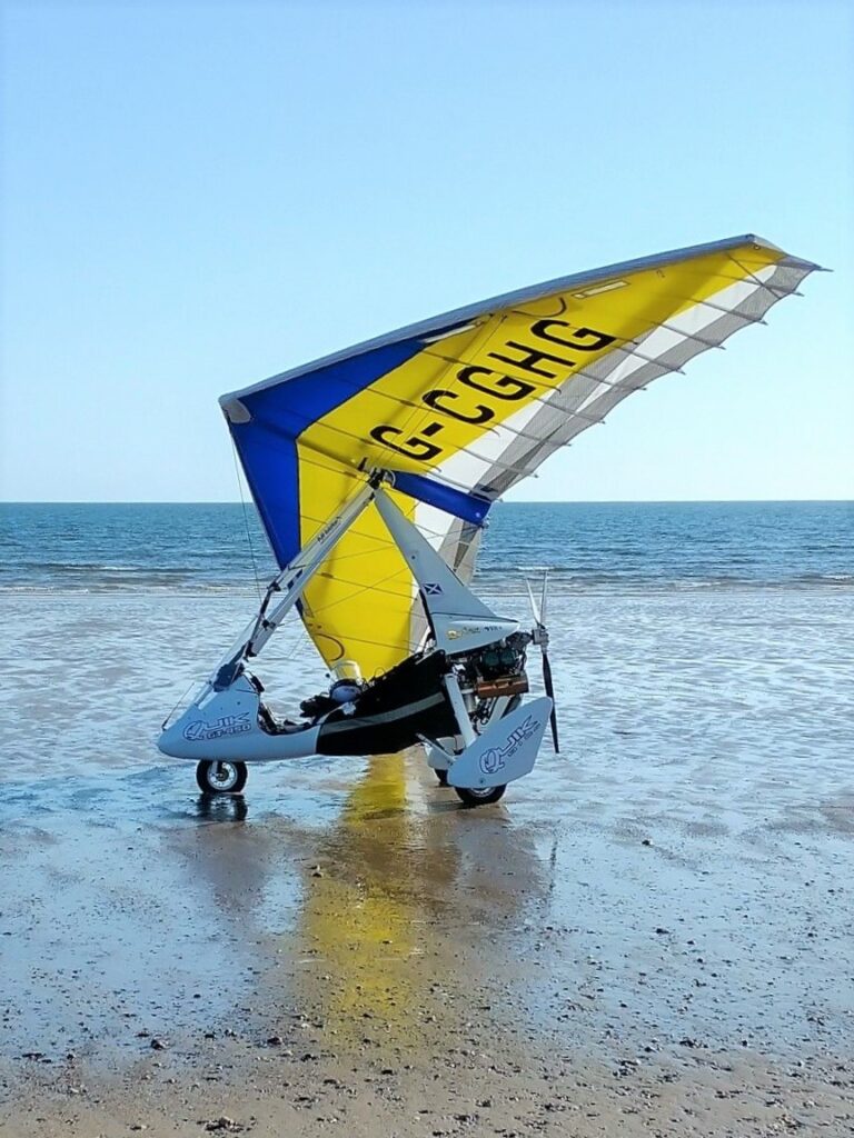 Bruce MacQuarrie from Carradale was in the right place at the right time to photograph this microlight aircraft that landed on Carradale beach last week.